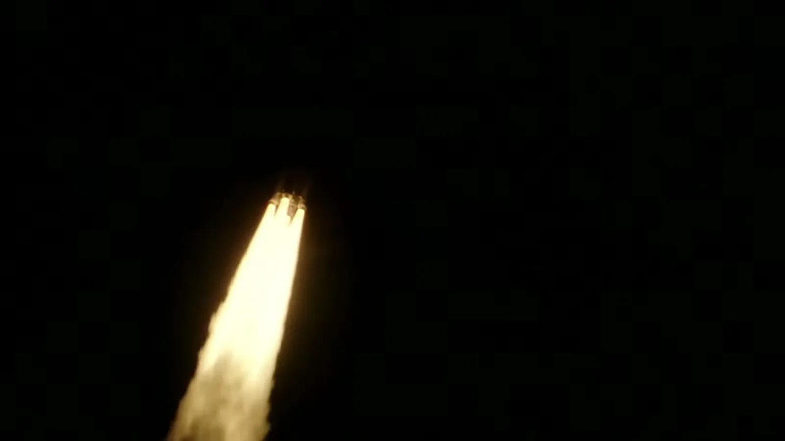 Chama do foguete H3 riscando o céu escuro cerca de 20 segundos após a decolagem