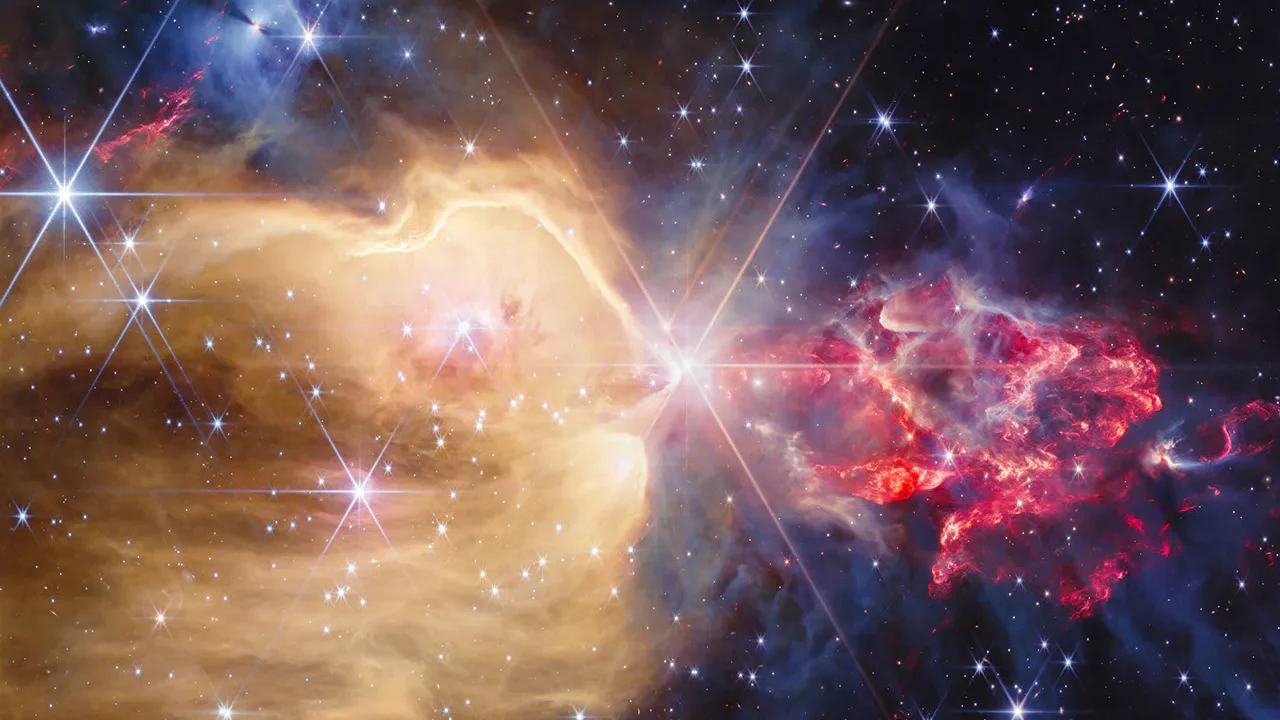 O Telescópio Espacial James Webb da NASA revelou muitas protoestrelas e estrelas dentro dos gases brilhantes de NGC 7129. O gás de hidrogênio atômico quente é mostrado aqui na região dourada, enquanto o gás de hidrogênio molecular mais frio, chocado por protoestrelas embutidas, é representado em