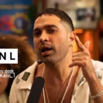 Don L fala ao microfone durante gravação do Tiny Desk Brasil, com caixa de texto "DON L" na tela